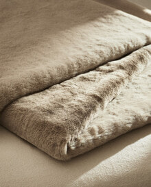 Double-textured faux fur throw