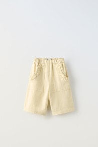 Bermuda shorts with gathered pockets