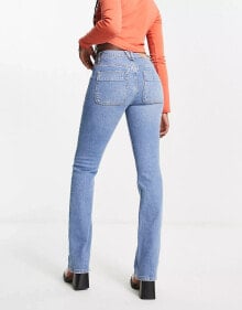 Free People – Schmal geschnittene Bootcut-Jeans in Hellblau mit niedrigem Bund