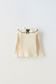 Ribbed top with bow and collar detail
