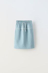 Plush skirt with seams