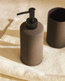 Dark metal bathroom soap dispenser