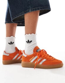 adidas Originals – Handball Spezial – Sneaker in Orange und Silber mit Gummisohle