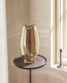 Tall shiny glass vase