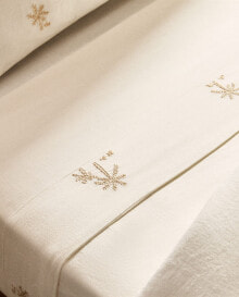 Flat sheet with embroidered palm trees