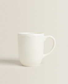 Earthenware mug with a raised-design edge