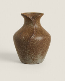 Ceramic vase with opening