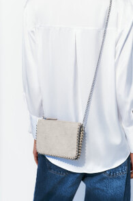 Clutch bag with studs