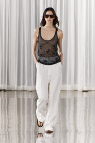 Semi-sheer creased-effect beaded top