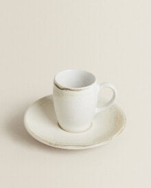 Stoneware coffee cup and saucer