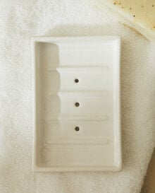 White earthenware bathroom soap dish