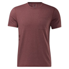Мужские спортивные футболки Мужская спортивная футболка красная REEBOK Les Mills Pocket Short Sleeve T-Shirt