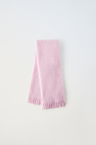 Knit scarf with fringing