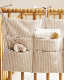 Striped cot organiser