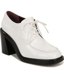 Белые женские туфли на каблуке