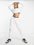 Фото #4 товара Nike Air fleece joggers in white