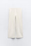 Wide-leg knit trousers