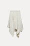 ASYMMETRIC PLEATED SKIRT