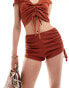 Фото #1 товара ASOS DESIGN co-ord textured ruched side micro shorts in rust