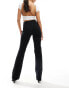 The Couture Club emblem soft touch yoga pants in black