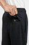 Фото #9 товара Спортивные брюки Nike Sportswear Fleece Jogger Taper Leg черного цвета