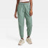 Фото #1 товара Women's Lined Winter Woven Joggers - All in Motion Green XS