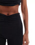 Фото #4 товара ASOS 4505 soft touch slim kick flare with ruched waist in black