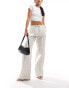 Фото #1 товара Bershka tie waist wide leg linen trousers in ecru stripe