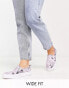 Фото #1 товара ASOS DESIGN Wide Fit Dotty slip on plimsolls in lilac celestial print