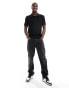 Фото #4 товара GANT pointelle textured knit polo in black