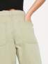 Фото #3 товара ASOS DESIGN Petite slouchy straight leg trousers in khaki