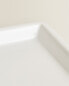 White earthenware bathroom tray