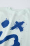 Spray print t-shirt