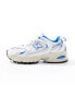 New Balance 530 trainers in white and metallic blue