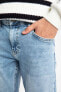 Фото #4 товара Skinny Comfort Fit Dar Rahat Kalıp Normal Bel Ekstra Dar Paça Yırtık Detaylı Jean Pantolon