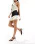 Фото #2 товара Kaiia pleated contrast pleat hem mini skirt in black and cream