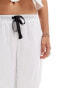 Labelrail x Daisy Birchall bow detail longline bloomer capri trousers in white