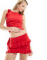 Lioness ruffle detail mini skirt co-ord in red