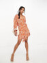 ASOS DESIGN plisse wrap collared mini dress in orange zebra print