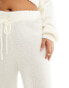 In The Style Plus fluffy trouser co-ord in cream