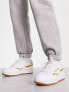 Reebok club C double trainers in white and orange