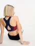 Nike Training Swoosh flyknit bra in red