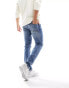 Фото #4 товара ASOS DESIGN – Stretch-Jeans mit schmalem Schnitt in getönter, mittlerer Waschung