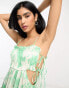 ASOS DESIGN ruched bust mini dress with tie detail and cut out in green floral print