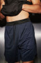DryMove™ Stretch sports shorts with zipped pockets