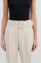 Trousers with lined belt
