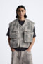 Gilet with utility pockets