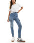 Фото #1 товара Miss Selfridge cargo skinny jean in mid blue wash