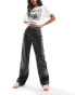 Фото #2 товара Vero Moda leather look wide leg dad trouser in black with contrast white stitching