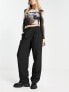 Фото #1 товара Only tailored low rise slouchy trousers in black